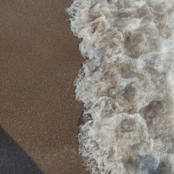 Optimizing Coastal Barriers with Crushable Granular Materials in India